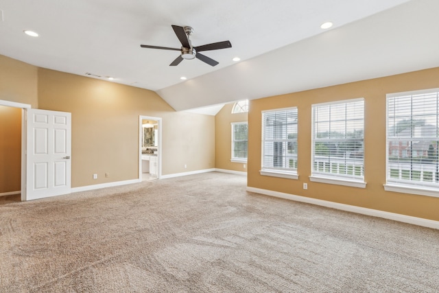 9434 Abbey Rd, Irving, TX 75063 - carpeted empty room with ceiling fan, baseboards, vaulted ceiling, and recessed lighting