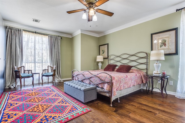 7200 Randall Way, Plano, TX 75025 - bedroom featuring wood finished floors, baseboards, ornamental molding, and a ceiling fan