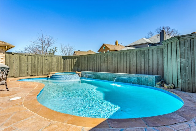 7200 Randall Way, Plano, TX 75025 - view of pool with an in-ground hot tub and a fenced backyard
