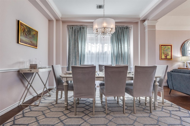 7200 Randall Way, Plano, TX 75025 - dining area with a chandelier, healthy amount of natural light, ornamental molding, and wood finished floors