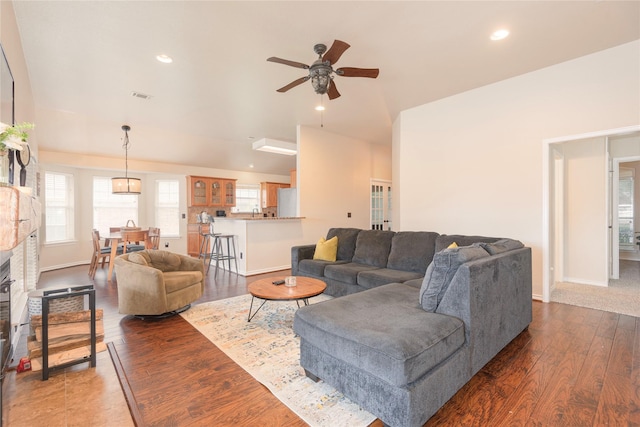 living area with ceiling fan, dark wood-type flooring, baseboards, and recessed lighting