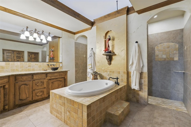 9008 Reata W Dr, Benbrook, TX 76126 - full bathroom with ornamental molding, tile patterned floors, a garden tub, vanity, and backsplash
