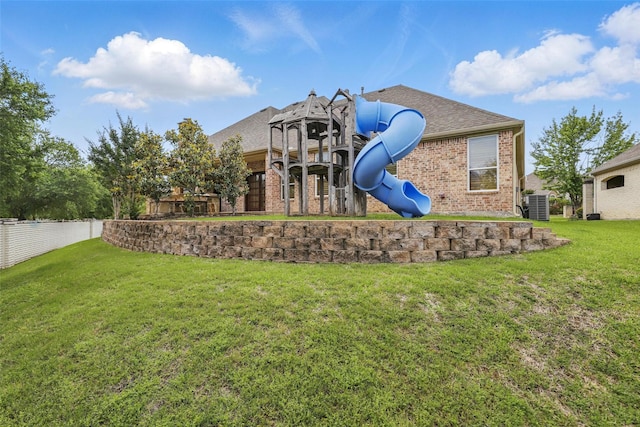 9008 Reata W Dr, Benbrook, TX 76126 - view of jungle gym with a yard and central AC