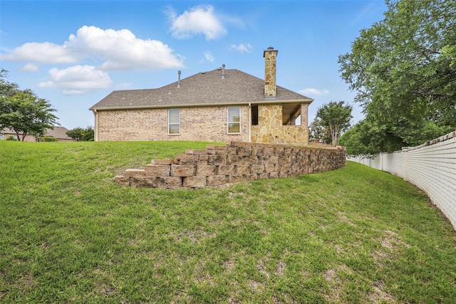 9008 Reata W Dr, Benbrook, TX 76126 - rear view of house featuring a chimney and a shingled roof