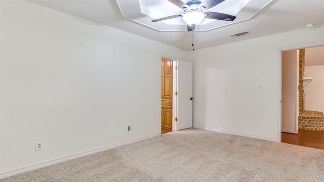 309 W 5th St, Justin, TX 76247 - unfurnished bedroom featuring carpet, baseboards, connected bathroom, and ceiling fan