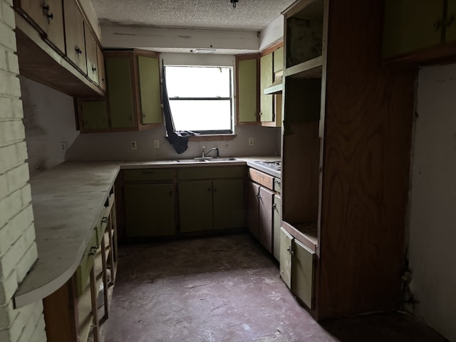 207 County Road 1739, Yantis, TX 75497 - kitchen with a sink, wall chimney exhaust hood, a textured ceiling, light countertops, and unfinished concrete flooring