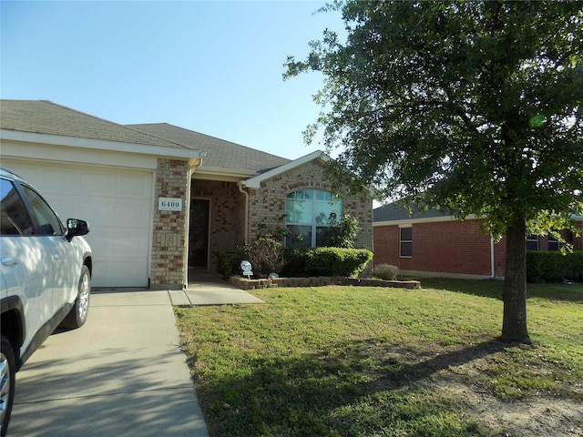 6400 Stone Lake Dr, Fort Worth, TX 76179 - ranch-style house featuring an attached garage, a front yard, brick siding, and concrete driveway