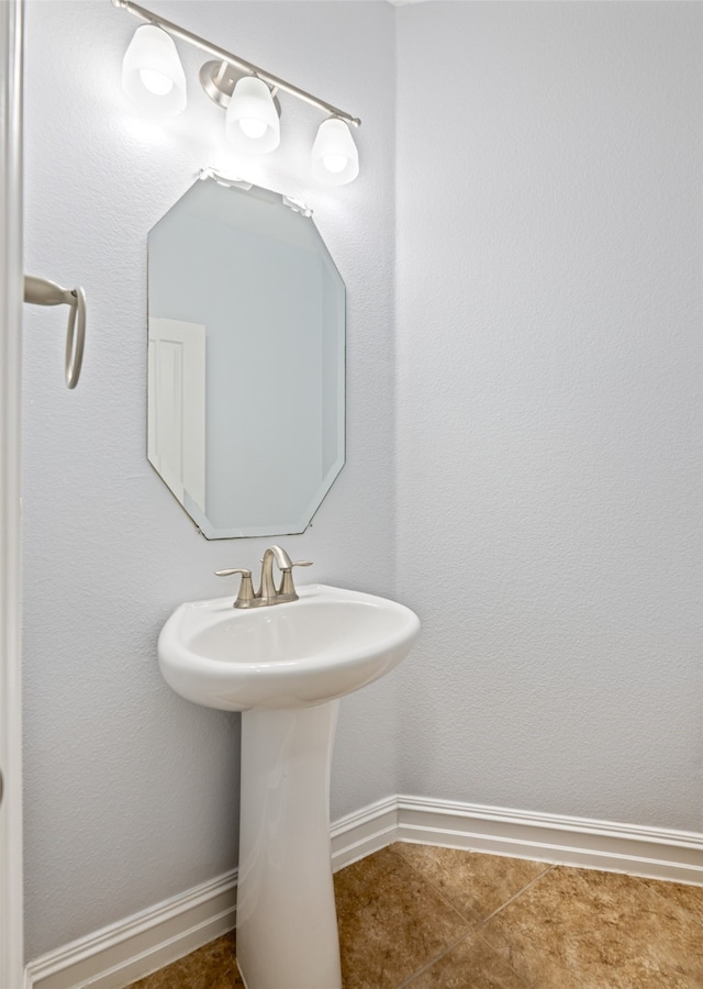 1056 Enchanted Rock Dr, Allen, TX 75013 - bathroom with baseboards and a sink