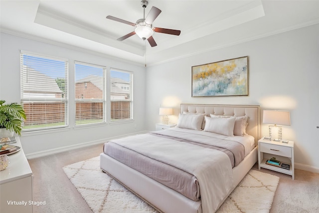 1056 Enchanted Rock Dr, Allen, TX 75013 - bedroom featuring a raised ceiling, light colored carpet, crown molding, baseboards, and a ceiling fan