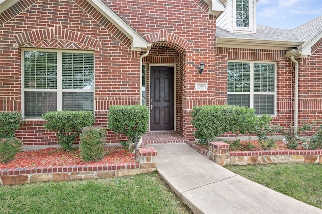 1056 Enchanted Rock Dr, Allen, TX 75013 - doorway to property with brick siding and a shingled roof