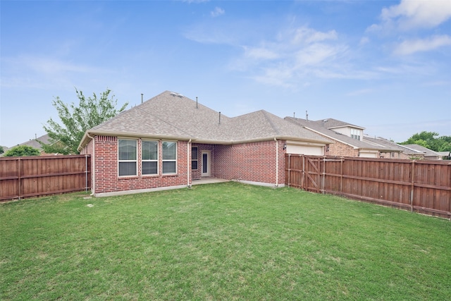 1056 Enchanted Rock Dr, Allen, TX 75013 - back of property featuring brick siding and a shingled roof