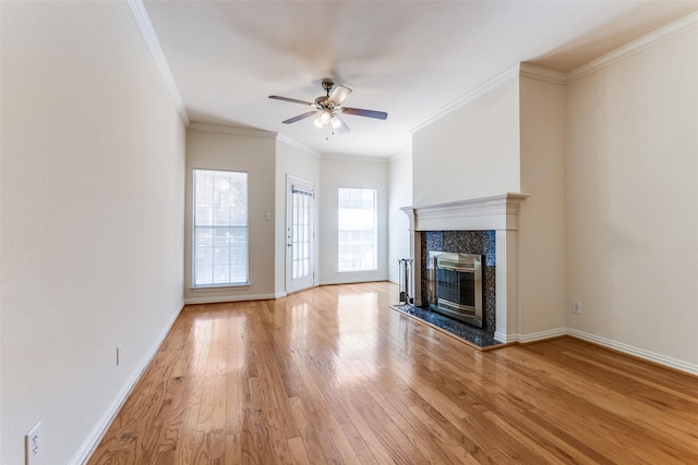 2524 Preston Rd Unit 204, Plano, TX 75093 - unfurnished living room featuring ceiling fan, light wood-type flooring, ornamental molding, baseboards, and a high end fireplace