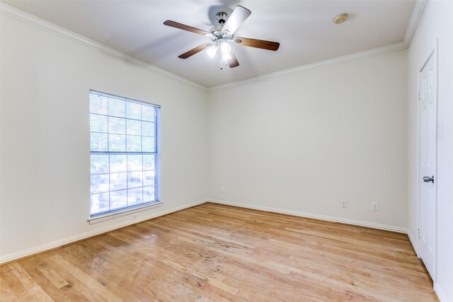 2524 Preston Rd Unit 204, Plano, TX 75093 - empty room featuring crown molding, light wood-type flooring, a smoke detector, and baseboards