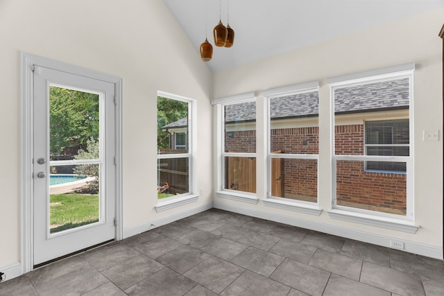 8204 Saint Clair Dr, Mckinney, TX 75071 - unfurnished sunroom with vaulted ceiling, healthy amount of natural light, and baseboards