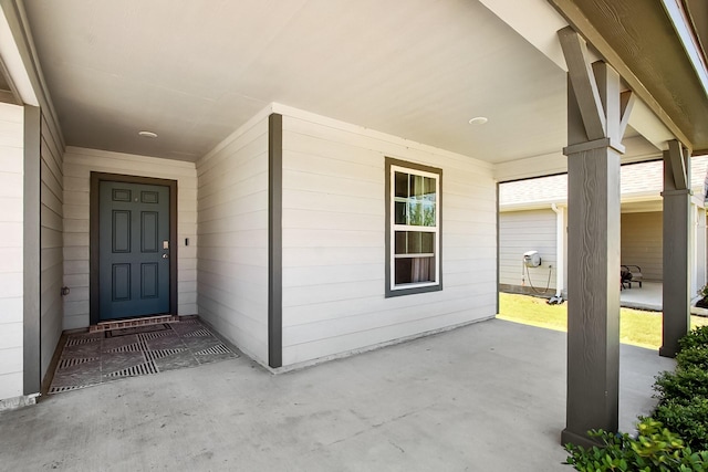 115 Rock Creek Ln, Terrell, TX 75160 - view of exterior entry featuring a patio area