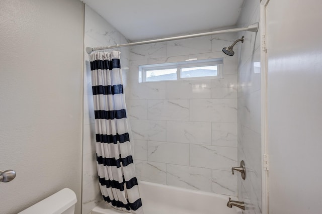 full bath with shower / bath combo and toilet