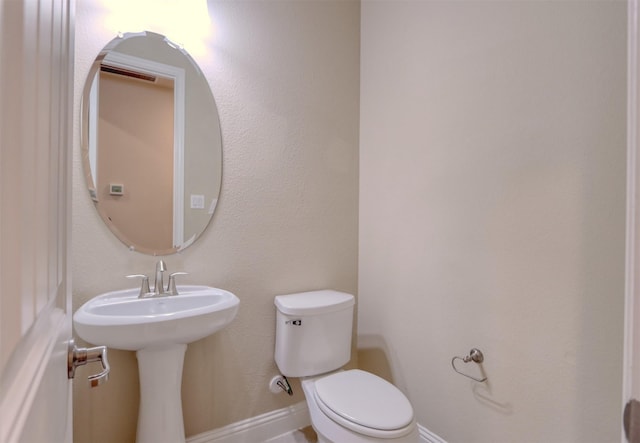 1306 Prato Ave, Mclendon Chisholm, TX 75032 - half bathroom featuring toilet and baseboards