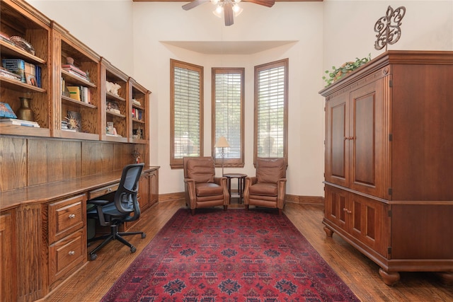 1607 Navarro Ct, Allen, TX 75013 - office space featuring a ceiling fan, built in desk, dark wood-type flooring, and baseboards