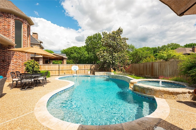 1607 Navarro Ct, Allen, TX 75013 - view of swimming pool with a fenced backyard, a pool with connected hot tub, and a patio
