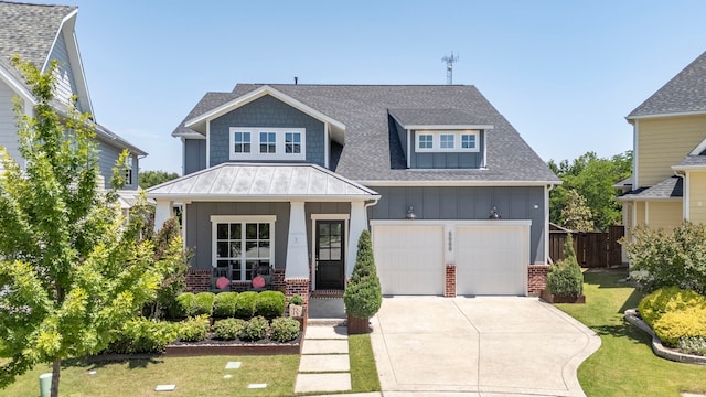 5000 Brush Hill Rd, Carrollton, TX 75010 - craftsman-style house with board and batten siding, covered porch, driveway, a shingled roof, and brick siding