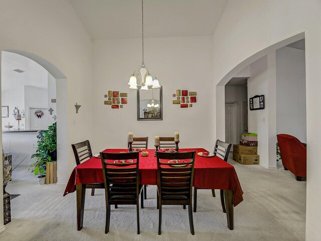 3929 Bonita Springs Dr, Fort Worth, TX 76123 - dining room with carpet flooring, a chandelier, and arched walkways