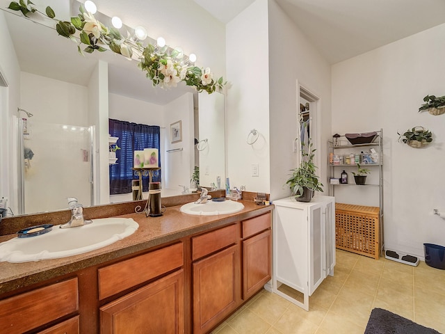 3929 Bonita Springs Dr, Fort Worth, TX 76123 - full bathroom featuring an enclosed shower, tile patterned floors, and double vanity
