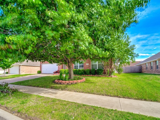 3929 Bonita Springs Dr, Fort Worth, TX 76123 - view of property hidden behind natural elements with brick siding, concrete driveway, and an attached garage