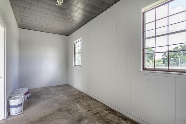 943 Lone Star Rd, Whitesboro, TX 76273 - empty room featuring concrete flooring