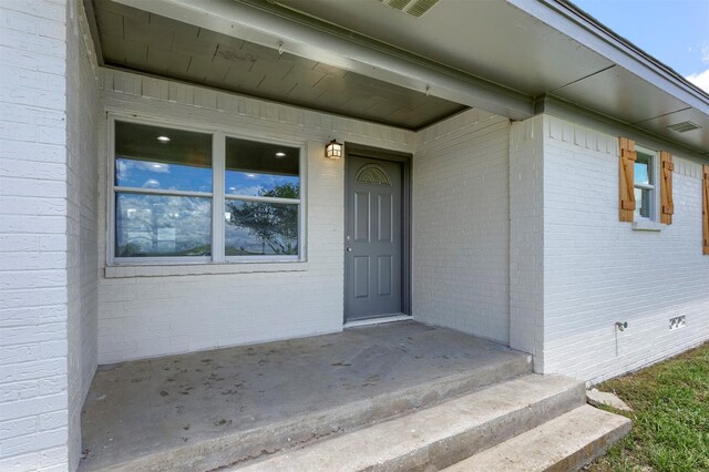 943 Lone Star Rd, Whitesboro, TX 76273 - property entrance featuring brick siding