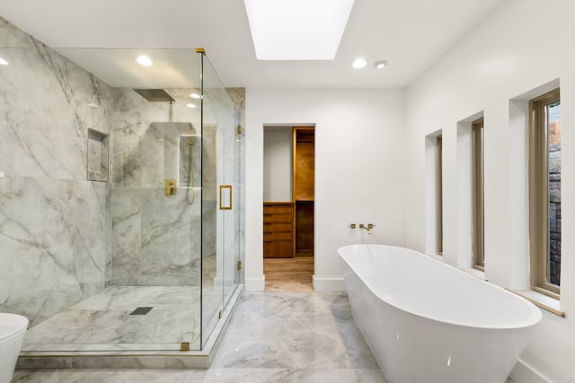 9415 Hill View Dr, Dallas, TX 75231 - bathroom with marble tiled flooring, a soaking tub, a marble finish shower, toilet, and recessed lighting