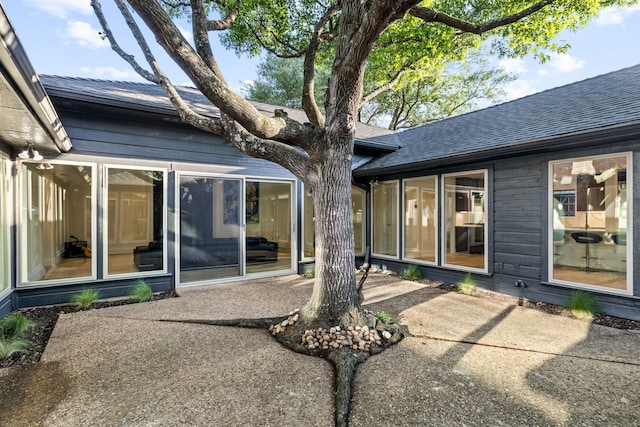 9415 Hill View Dr, Dallas, TX 75231 - rear view of house featuring a patio area and a shingled roof