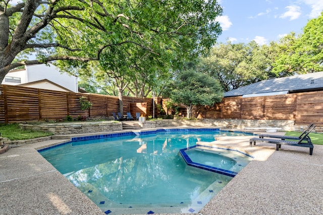 9415 Hill View Dr, Dallas, TX 75231 - view of pool with a fenced backyard and a pool with connected hot tub