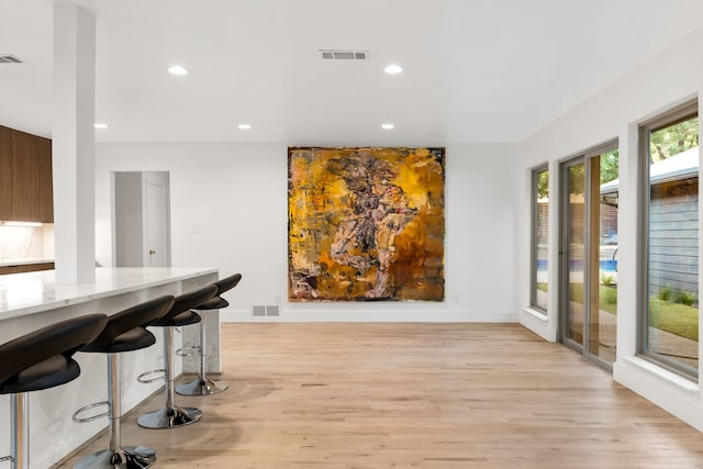9415 Hill View Dr, Dallas, TX 75231 - dining space with recessed lighting, light wood-type flooring, and baseboards
