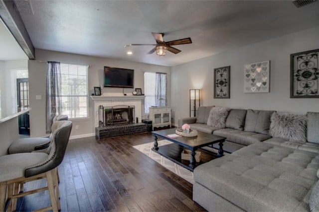 2505 Wilma Ln, Plano, TX 75074 - living area with a ceiling fan, plenty of natural light, and hardwood / wood-style flooring