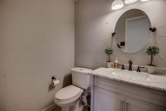 2505 Wilma Ln, Plano, TX 75074 - bathroom featuring vanity and toilet