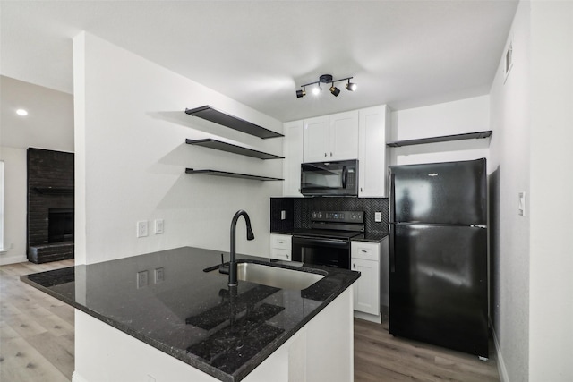 2401 Sherry St Unit A & B, Arlington, TX 76014 - kitchen with black appliances, open shelves, a sink, light wood-type flooring, and recessed lighting