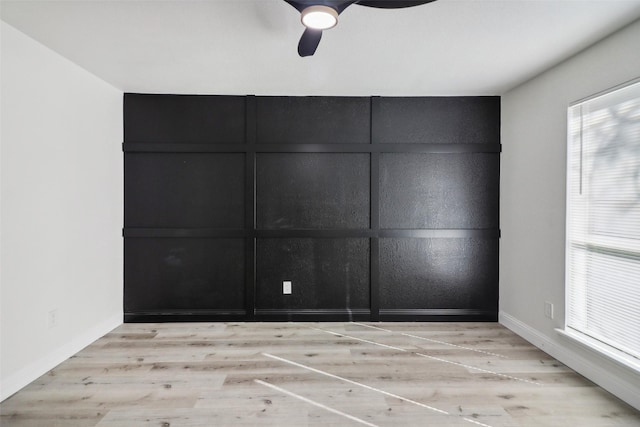 2401 Sherry St Unit A & B, Arlington, TX 76014 - empty room with light wood finished floors, a ceiling fan, and baseboards
