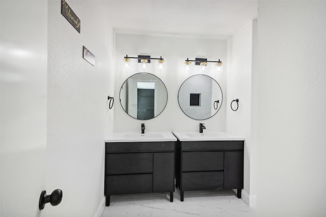2401 Sherry St Unit A & B, Arlington, TX 76014 - bathroom with marble look tiles, two vanities, and baseboards