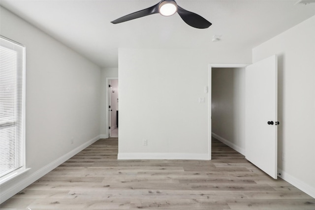 2401 Sherry St Unit A & B, Arlington, TX 76014 - unfurnished bedroom featuring light wood-style flooring, baseboards, and ceiling fan