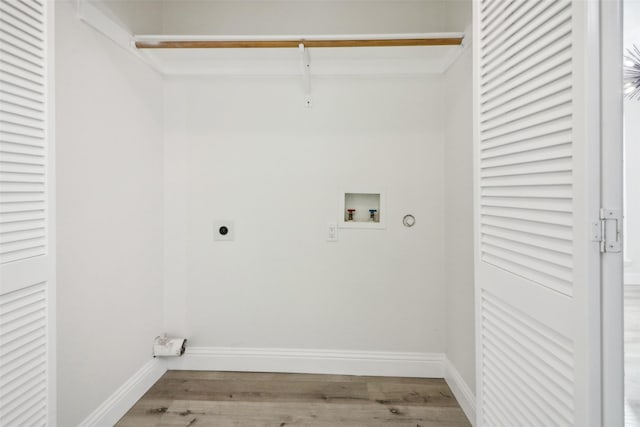 2401 Sherry St Unit A & B, Arlington, TX 76014 - laundry room with electric dryer hookup, washer hookup, wood finished floors, and baseboards