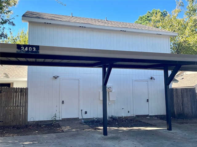 2401 Sherry St Unit A & B, Arlington, TX 76014 - view of outbuilding with fence and covered parking