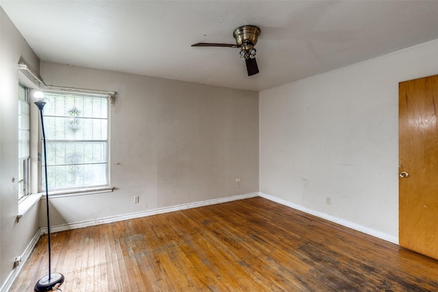 1231 Arizona Ave, Dallas, TX 75216 - unfurnished room featuring ceiling fan, wood-type flooring, and baseboards