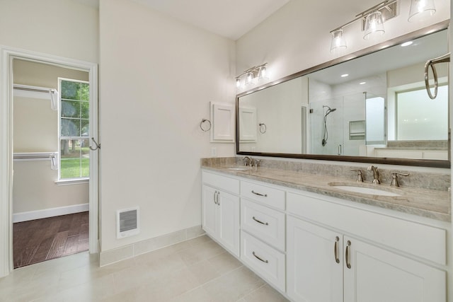 102 Fontana Ct, Allen, TX 75013 - full bath with a shower stall, baseboards, double vanity, and tile patterned flooring