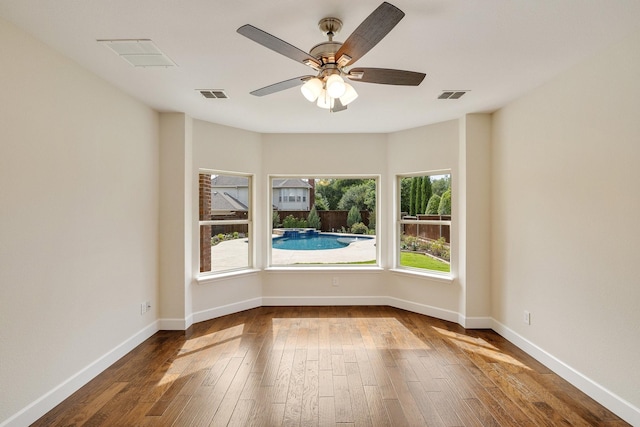 102 Fontana Ct, Allen, TX 75013 - unfurnished room featuring dark wood-type flooring, a ceiling fan, and baseboards