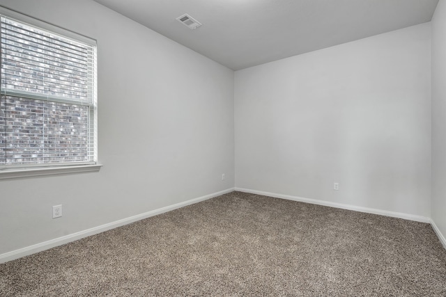 5500 Persimmon Dr, Denton, TX 76207 - unfurnished room with carpet and baseboards
