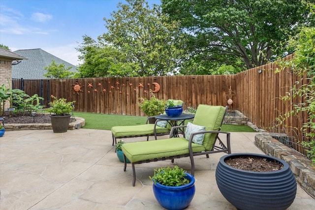10013 Stoneleigh Dr, Benbrook, TX 76126 - view of patio / terrace featuring a fenced backyard and outdoor dining area