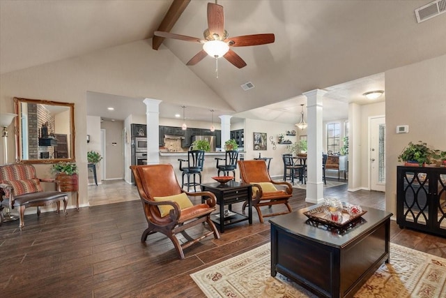 10013 Stoneleigh Dr, Benbrook, TX 76126 - living area featuring ornate columns, a ceiling fan, beamed ceiling, high vaulted ceiling, and wood finished floors