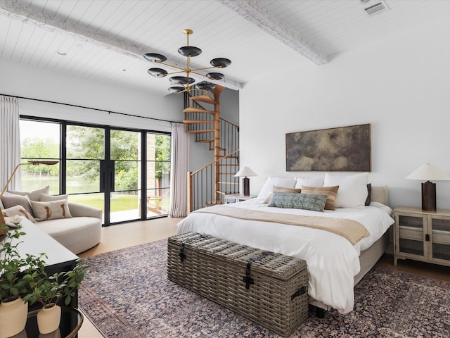 bedroom featuring access to outside, beamed ceiling, and wooden ceiling