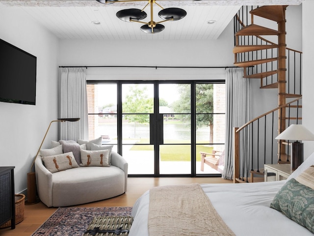 bedroom featuring wood finished floors and wood ceiling