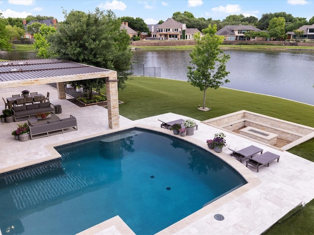 outdoor pool featuring a patio, a lawn, a water view, and outdoor lounge area